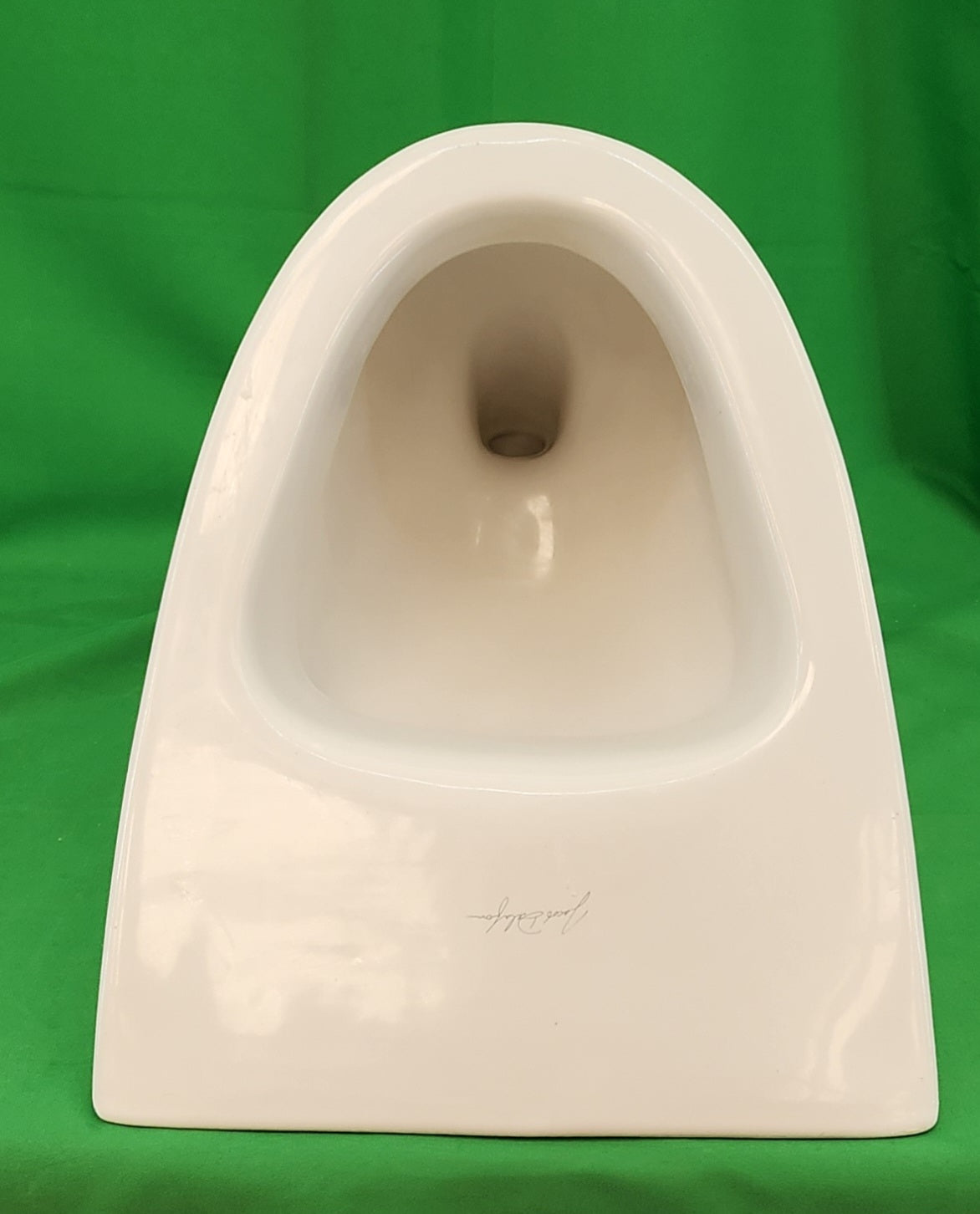 Urinoir en céramique blanche de la marque Jacob Delafon - Bon état