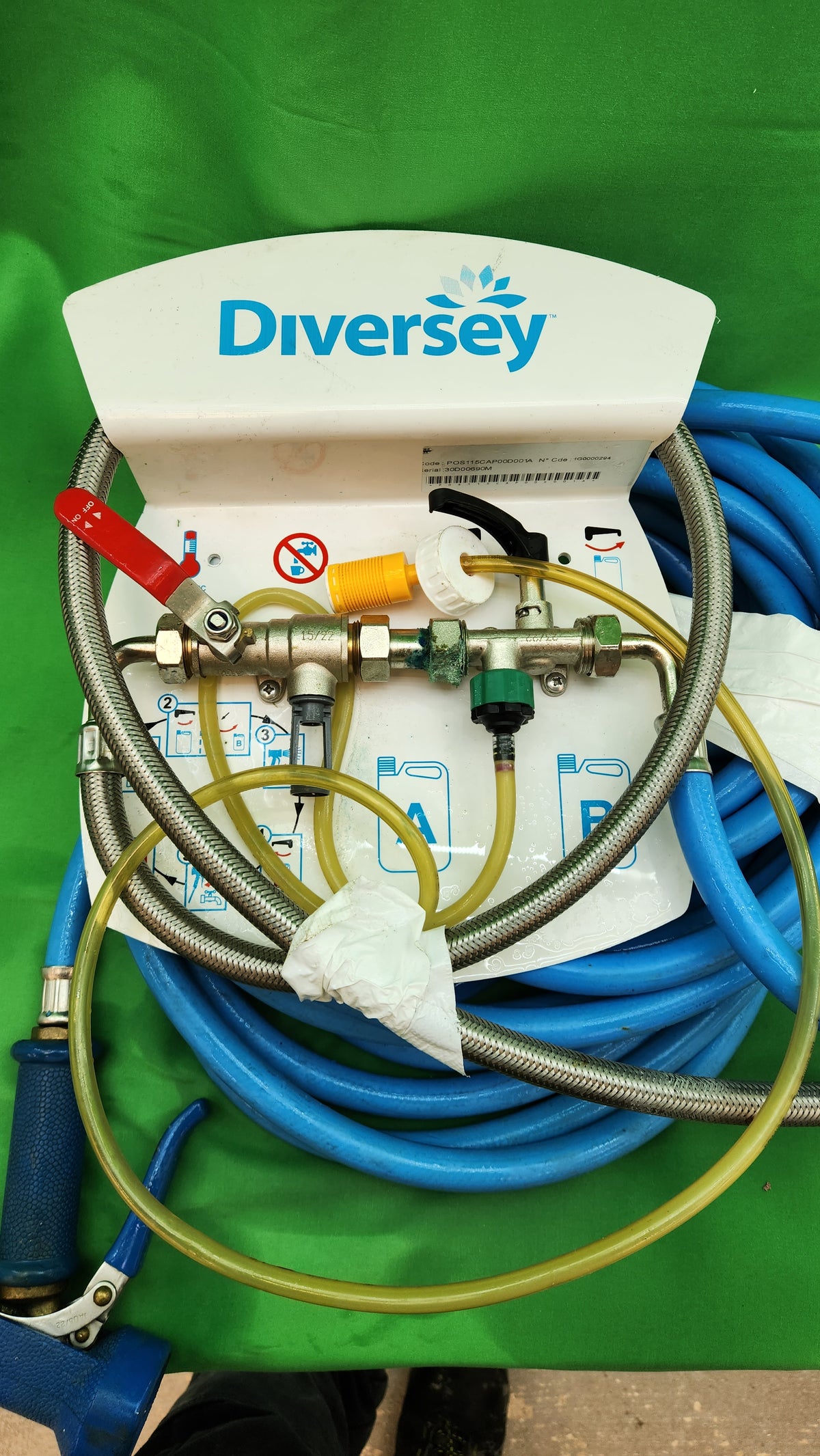 Système de dilution produits nettoyage Diversey avec flexible