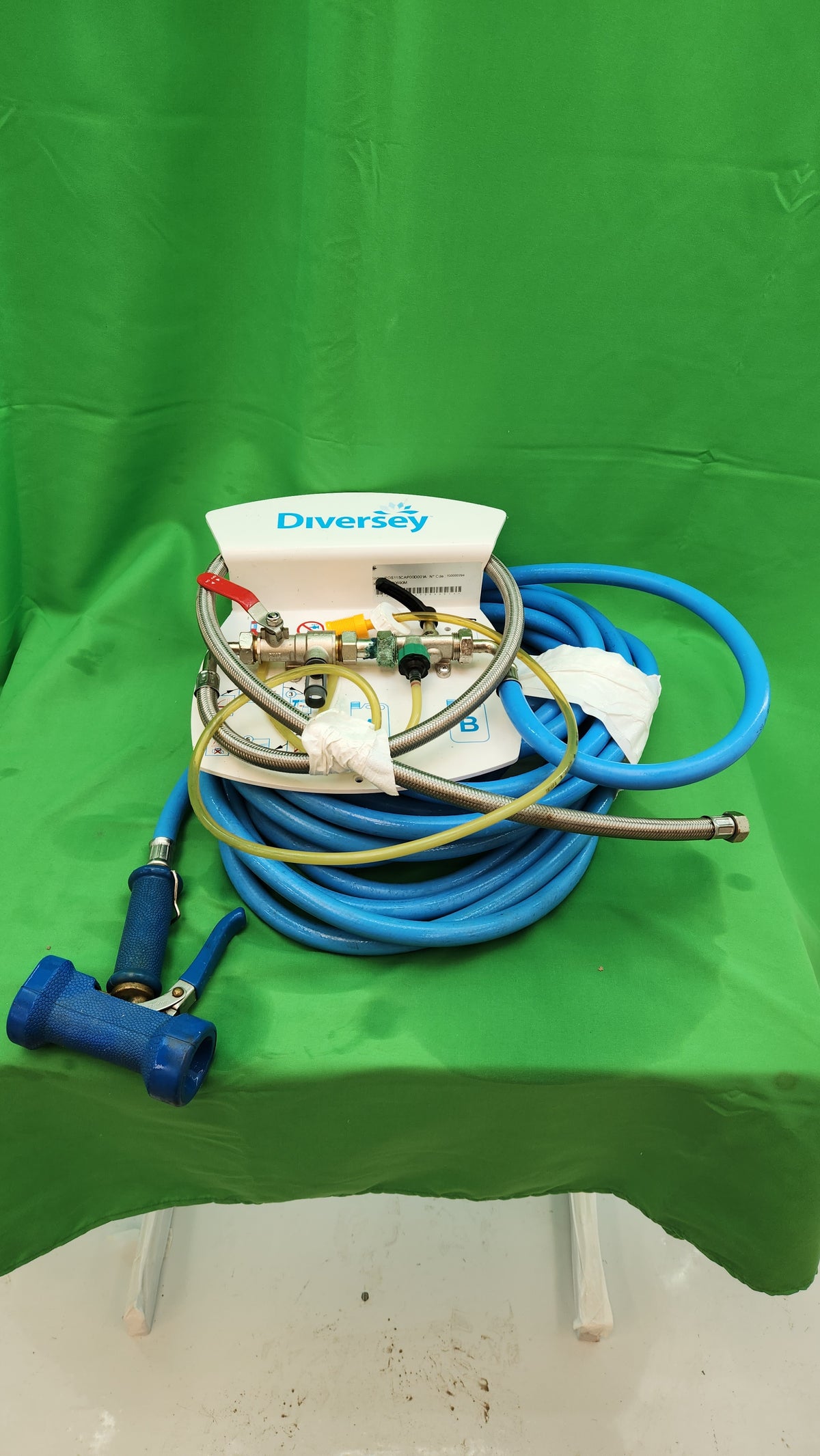 Système de dilution produits nettoyage Diversey avec flexible